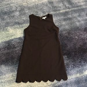 LBD. Scalloped bottom black dress